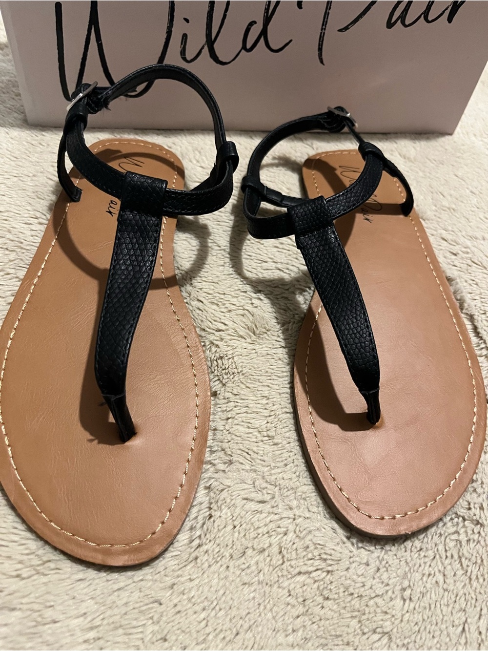 Wild Pair Black T-Strap Sandals with Tan Footbed
